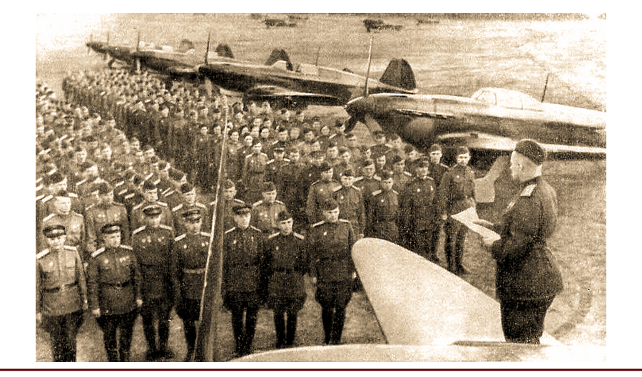 Вручение управлению и частям 274-й ИАД гвардейских знамен, 3 мая 1943 года. На заднем плане видны истребители Як-9 и Як-7Б.